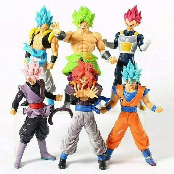 Dragon Ball figures displayed on a collector shelf with boxed collectibles
